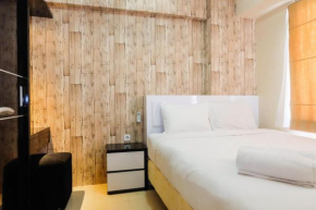 Modern 2BR with City View at Bassura Apartment By Travelio